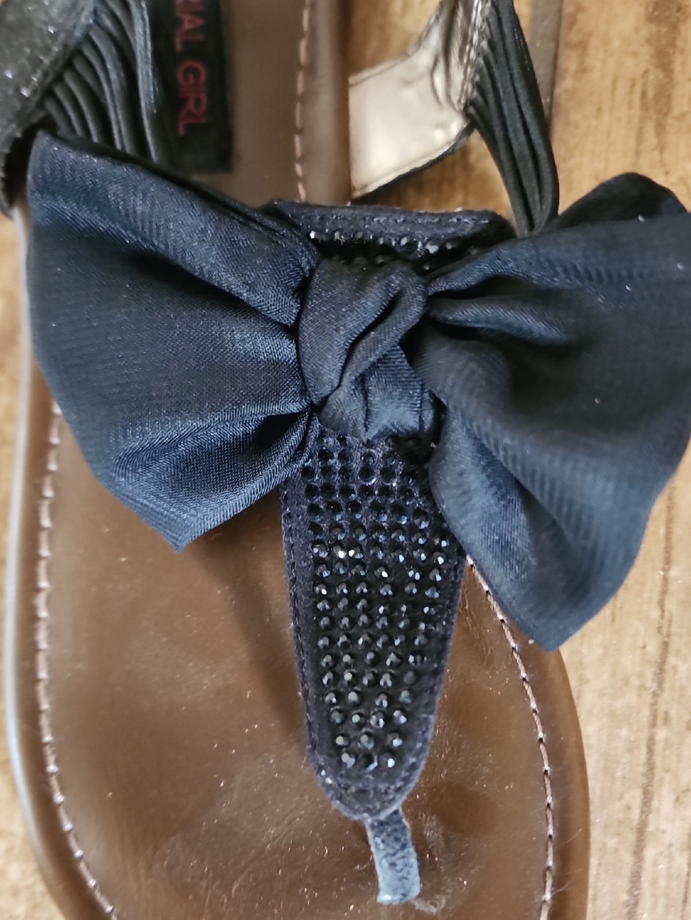Material Girl Black Bow T-Strap Sandals with Rhinestone Detail - Picture 3 of 3
